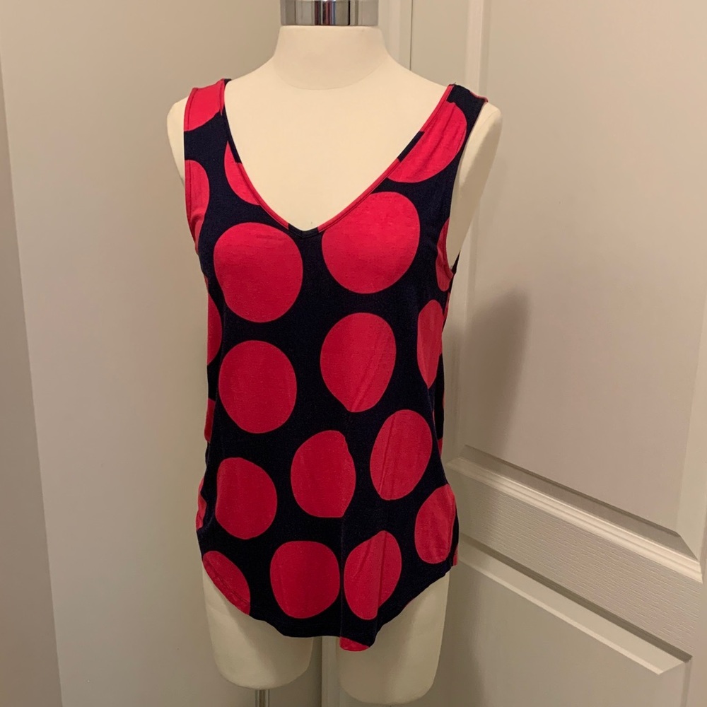 Sleeveless V-neck tank top navy blue with large pink polka dot pattern